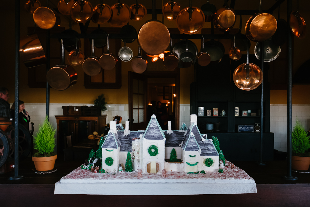 Biltmore's kitchen at Christmas, with a replica gingerbread house